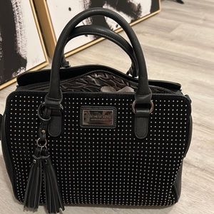 Marc New York black leather and velvet purse with a tassel medium size